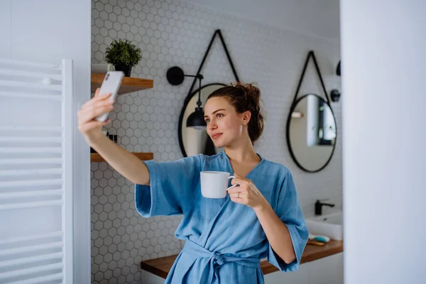Young Woman Taking Selfie Bathroom Enjoying Cup Coffee — Stock Photo, Image