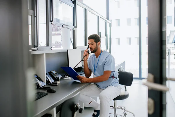 Young Multiracial Doctor Sitting His Office Calling — Stock Photo, Image