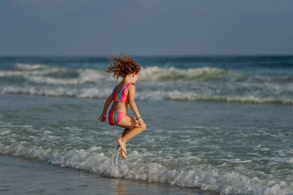 Little Girl Swimsuit Jumping Sea Enjoying Summer Holiday — Stock Photo, Image