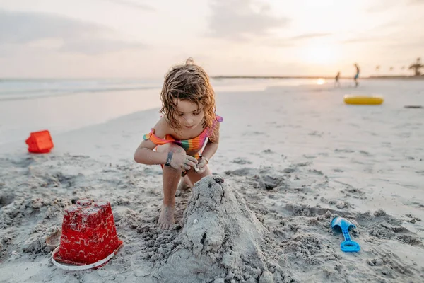 Little Girl Playing Beach Building Sand Castle — Foto Stock