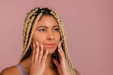 Portrait of a happy multiracial woman, studio shoot.