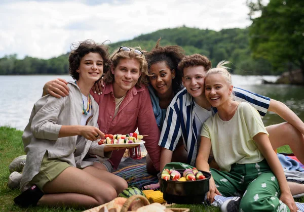 Group Multiracial Young Friends Camping Lake Having Barbecue Together — Zdjęcie stockowe