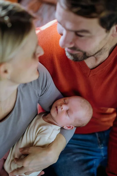Close Parents Cuddling Newborn Son — Stockfoto