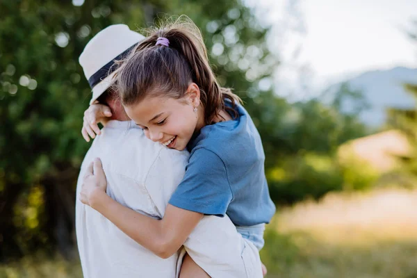 Father Hugging His Daughter Summer Nature Fathers Day Concept —  Fotos de Stock