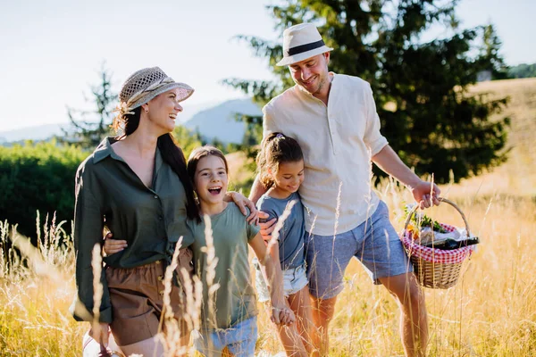 Happy Young Parents Daughters Walking Picnic Nature Summer Day — Foto de Stock