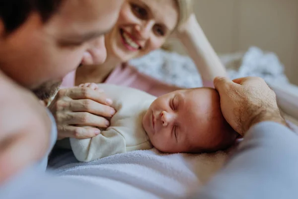 Close Parents Cuddling Newborn Son — Stockfoto