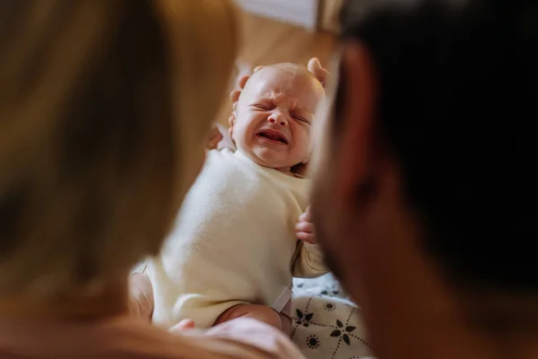 Close Parents Cuddling Newborn Crying Son — Stock Photo, Image