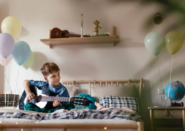 Happy Boy Playing Guitar Room — Stock fotografie