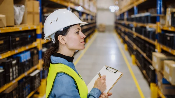 Warehouse Female Worker Checking Stuff Warehouse — Stok fotoğraf
