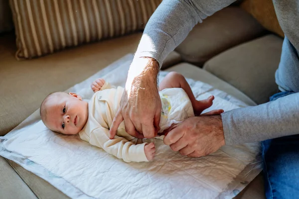 Mature Father Changing Diaper His Newborn Baby — Stock Photo, Image