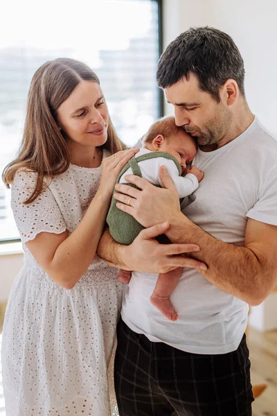 Happy Parents Cuddling Newborn Son — Stock Photo, Image