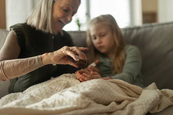 Senior Woman Taking Care Sick Granddaughter — Stock Photo, Image