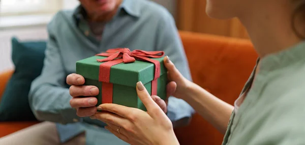 Senior Man Giving Gift His Caregiver — Stock Photo, Image