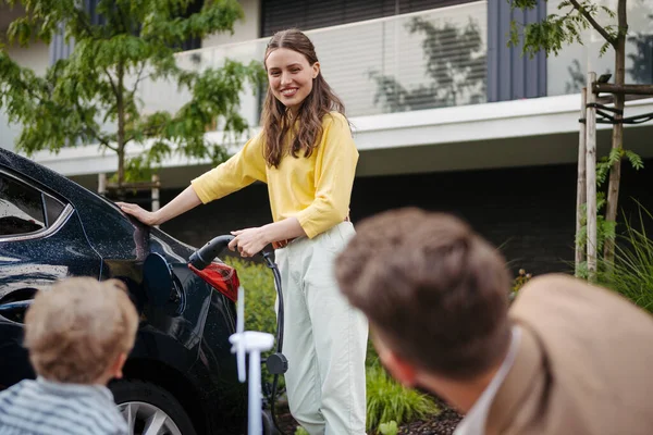 Happy Young Family Little Son Waiting Charging Electric Car — Stock Photo, Image