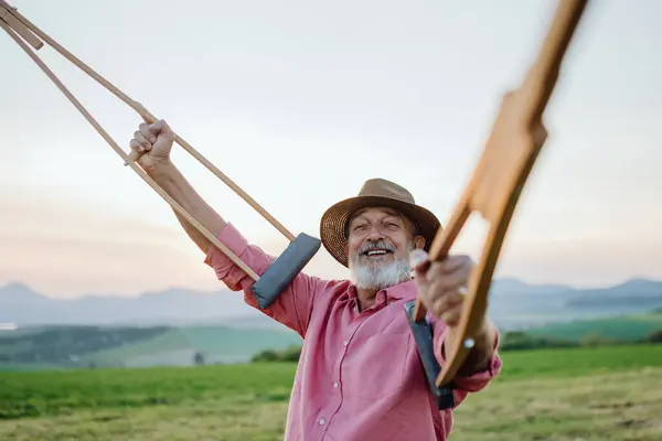 Senior Man Holding Crutches Air Happy His Recovery Recovery Rehabilitation — Stock Photo, Image