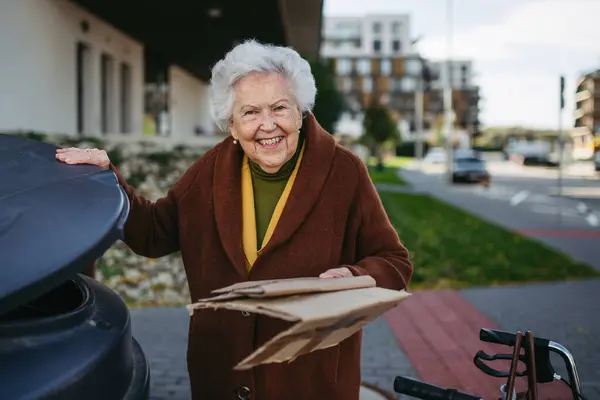 Elderly Woman Disposing Cardboard Garbage Can Waste Container Front Her — Stock Photo, Image