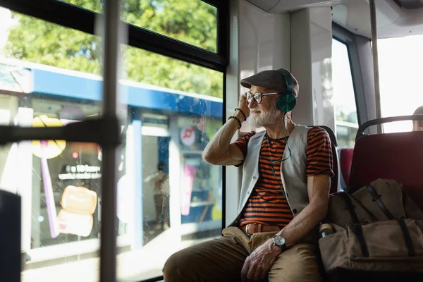 Elderly Man Traveling City Bus Listening Music Modern Headphones Senior — Stock Photo, Image