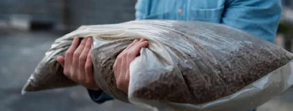 Man Holding Bag Wood Pellets Pellet Fuels Manufactured Wood Pellet — Stock Photo, Image