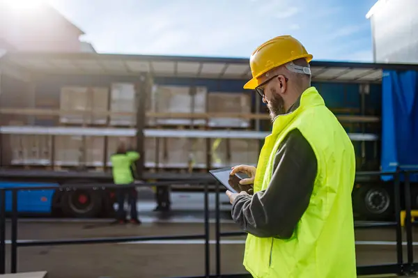 Warehouse Manager Overseeing Unloading Truck Holding Tablet Looking Cargo Details — Stock Photo, Image