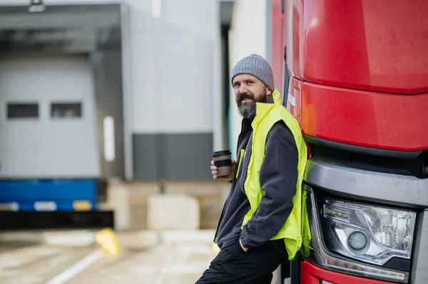 Truck Driver Leaning Hist Red Truck Drinking Coffee Waiting Warehouse — Stock Photo, Image