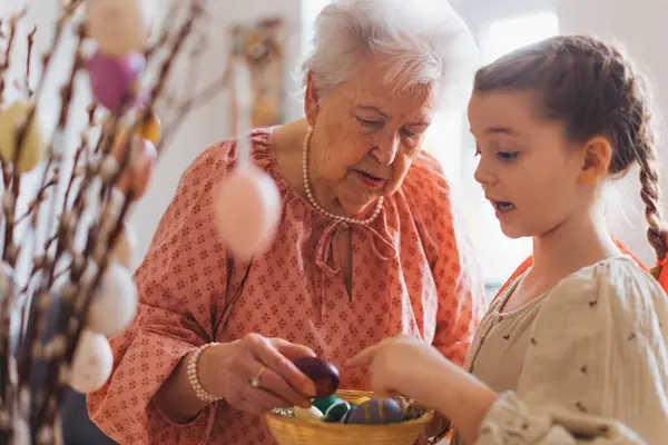 Grandmother Grandaughter Decorating Pussy Willows Branches Putting Easter Eggs Them — Foto Stock