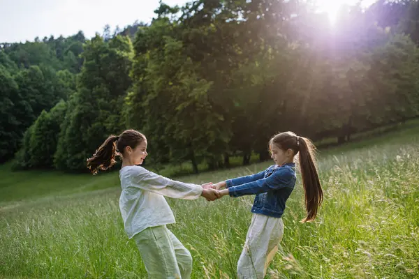 Two Sisters Playing Meadow Tall Grass Running Dancing Having Fun — Stock Photo, Image