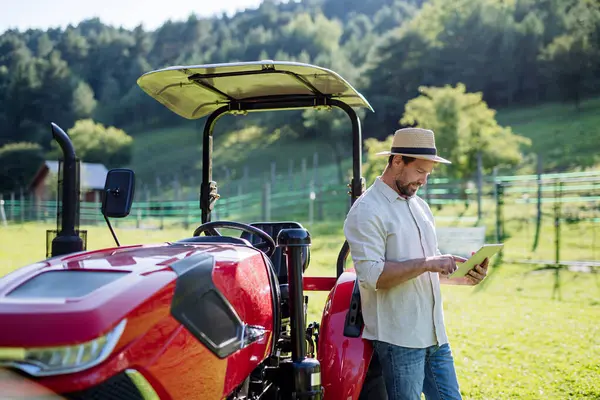 Farmer Reading Document Front Tractor Field Grants Loans Funding Opportunities — Stock Photo, Image