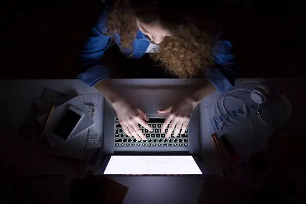 stock image Female university student having evening online class, e-learning sitting at home. Online consultation.