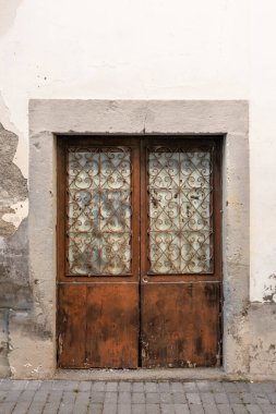 Aged Brown Wooden Door with Rustic Texture