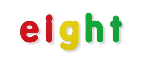 Osiem Słów Kolorowymi Literami Magnetycznymi Białym Koncepcją Ścieżki Wycinania — Zdjęcie stockowe
