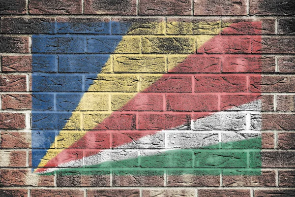 Seychelles Flag Old Brick Wall Background Blue Yellow Red White — Stock Photo, Image
