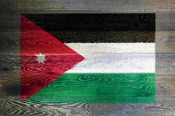 A Jordan flag on rustic old wood surface background