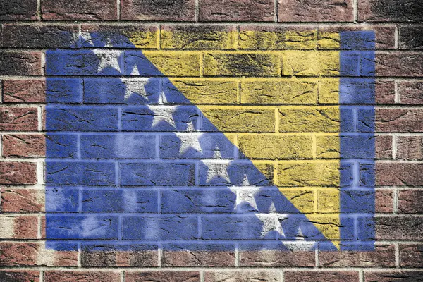 stock image A Bosnia Herzegovina flag on brick wall background