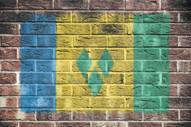 Eski tuğla duvarda bir Saint Vincent ve The Grenadines bayrağı mavi yeşil çizgili elmaslar