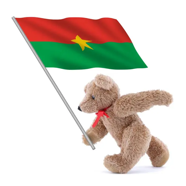 stock image A Burkina flag being carried by a cute teddy bear