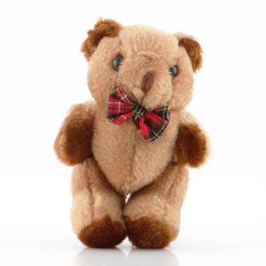 A small Teddy Bear with tartan bow clipart