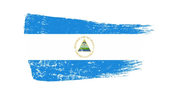 Grunge Brush Stroke Nicaragua Zászlóval — Stock Fotó
