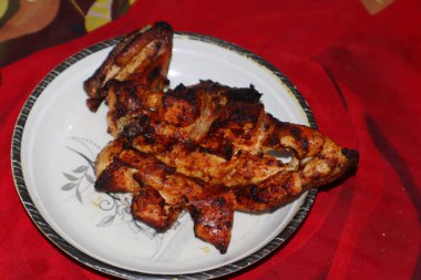 Barbekü Tavuk Tikka 'nın ağız sulandıran manzarasının tadını çıkarın.