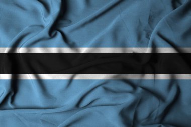  Sallanan kumaş dokusuyla seçici odak noktası botsvana faso bayrağı. 3B illüstrasyon