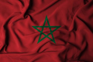 Sallanan kumaş dokusuyla Fas bayrağının seçici odak noktası. 3B illüstrasyon