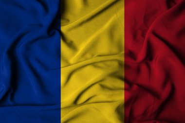 Sallanan kumaş dokusuyla seçici bir şekilde Romanya bayrağına odaklan. 3B illüstrasyon