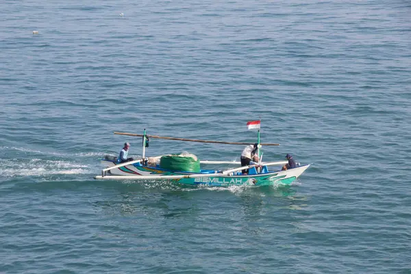 Stock image Krui West Coast, Lampung; May 29, 2024; view of local fishing boats in the middle of the sea looking for fish, photo taken from above