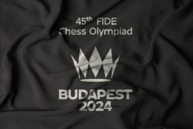 pringsewu, Lampung; September 26, 2024; Selective focus flag with waving fabric texture background FIDE Chess Olympiad Budapest 2024. 3D Illustration clipart