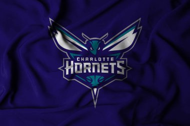 Pringsewu, Lampung; 16 Ekim 2024; Basketball Club Charlotte Hornets kumaş dokusunun seçici odak sallama bayrağı, NBA. 3d illüstrasyon