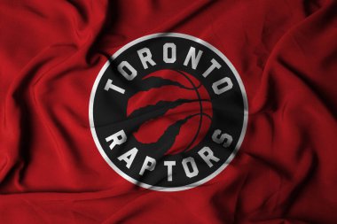 Pringsewu, Lampung; 16 Ekim 2024; Seçici odak sallayan kumaş dokusu bayrağı Toronto Raptors, NBA. 3d illüstrasyon