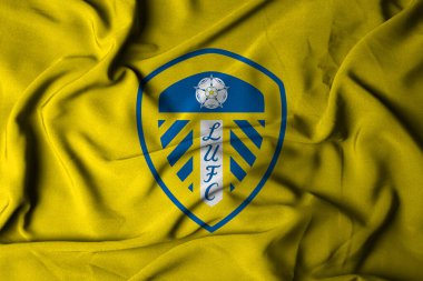 Pringsewu, lamba 23 Ekim 2024, Leeds United futbol kulübü, seçici odak bayrağı logosu arka plan premier lig eleme şampiyonası. 3d illüstrasyon