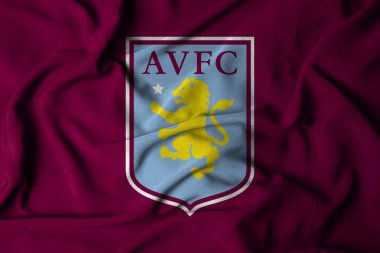 Aston Villa (AVFC) logosunun seçici odak noktası. Villa, Birmingham, İngiltere 'den profesyonel bir futbol kulübü. Akan kumaş dokusuyla. 3B illüstrati