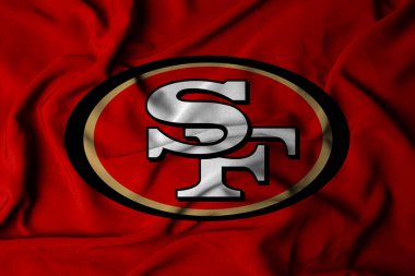 Pringsewu, Lampung; 5 Ocak 2025; Amerikan futbol takımı San Francisso 49ers 'ın logosu sallanan bir bayrak dokusu. 3B illüstrasyon