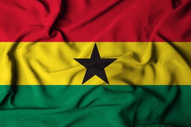 Gana bayrağının seçici odak noktası, dalgalı kumaş dokusuyla. 3B illüstrasyon