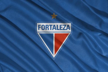 Pringsewu, Lampung Mayıs 08, 2025; Brezilya futbol kulübü Fortaleza logosu ve dalga dokusu arka planı. 3B illüstrasyon